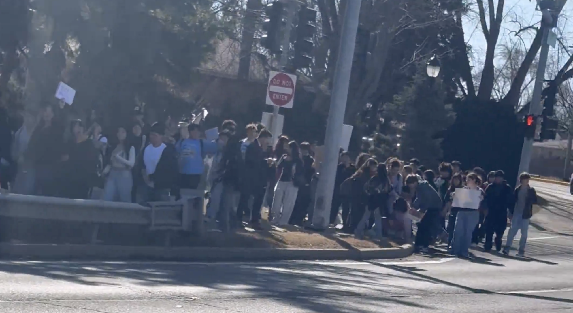 Kevin Morrison marches with students during a Prospect High School walkout, drawing criticism for allegedly organizing unsupervised protests without school or parental oversight.