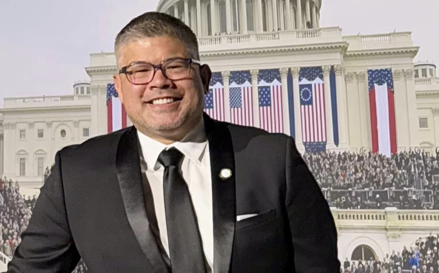 Students at Lyons Township High School in La Grange march through downtown on Feb. 17 during an anti-ICE protest, holding signs and chanting as part of a student walkout.
