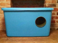 Rubbermaid bin with flower pot shelter