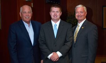 David Reimers with Jeff Fettig (CEO of Whirlpool) and his father, Randy.