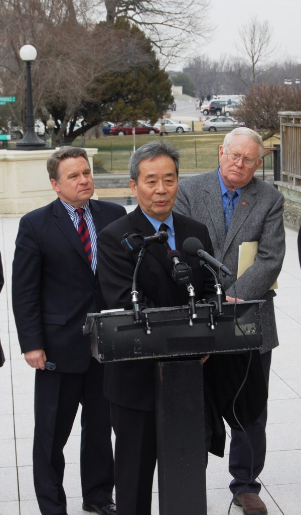 Harry Wu speaks at Hill press conference, flanked by U.S. Representatives Chris Smith (R-NJ) and Joe Pitts (R-PA).