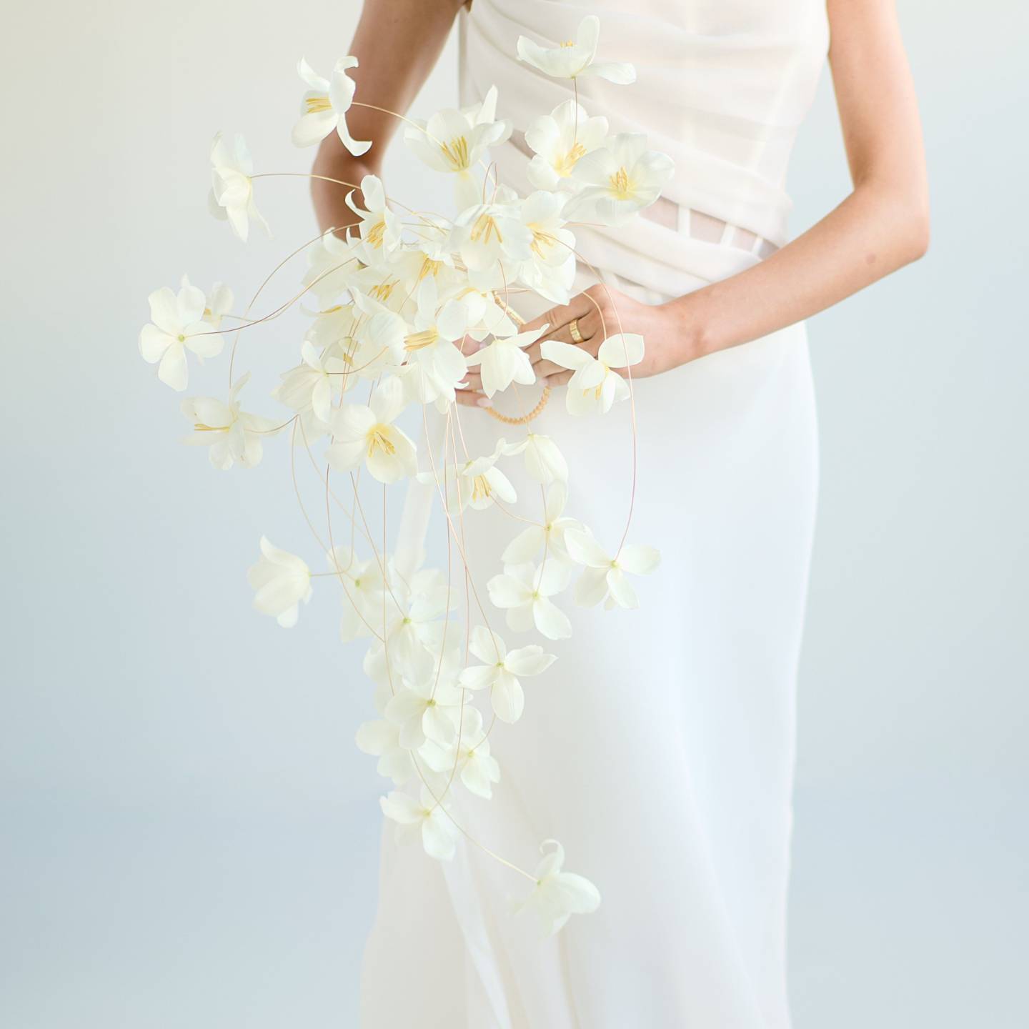 Wired white tulip cascade bouquet