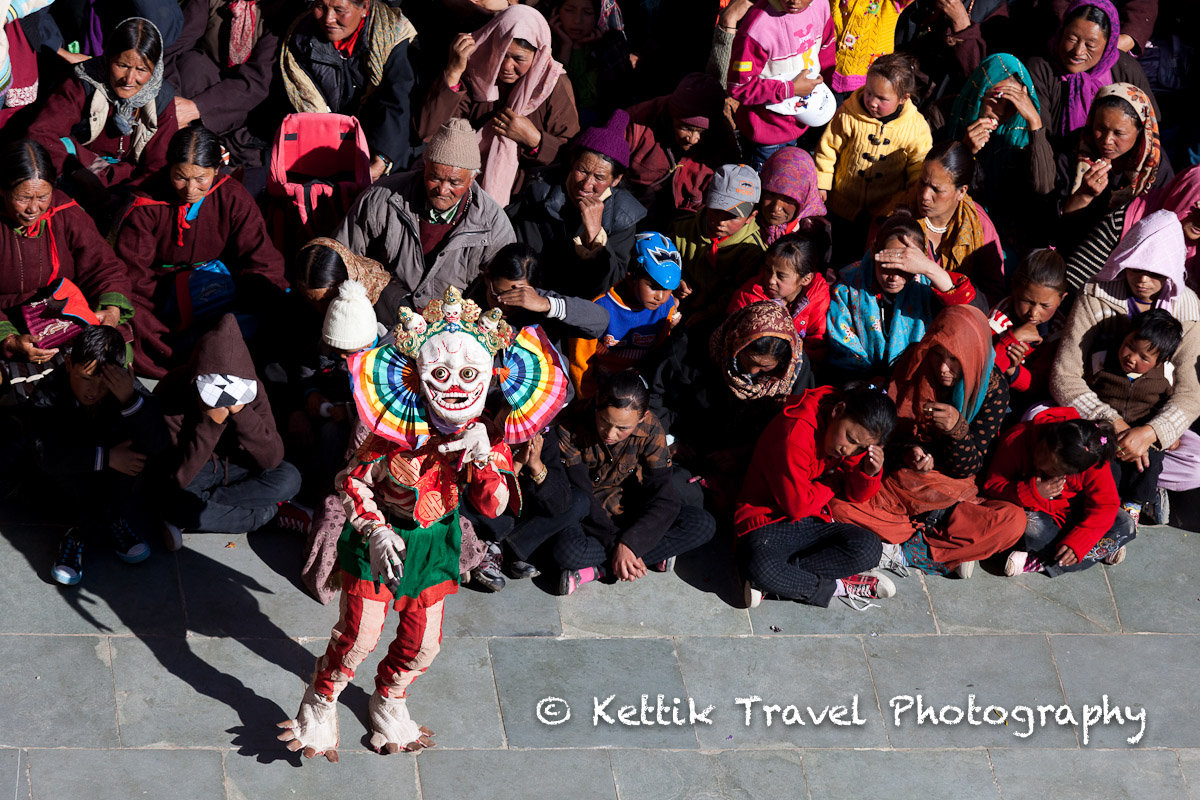 Buddhist mask dancers entertaining the crowds at the Thiksey Gustor.