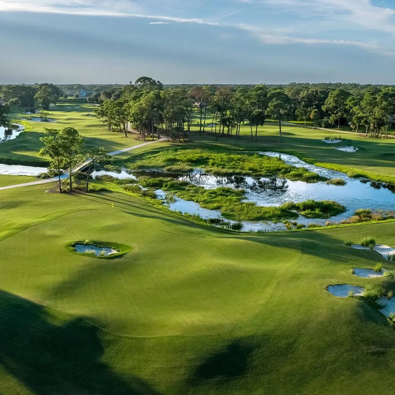 Picture of golf course with a water hazard