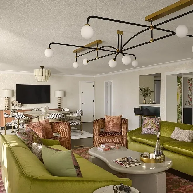 A lounge area with green furniture