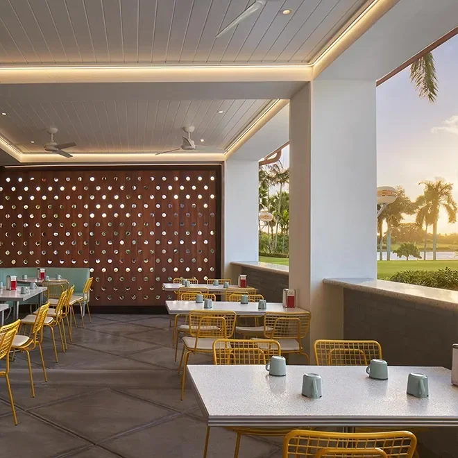 Outdoor dining area overlooking a golf course