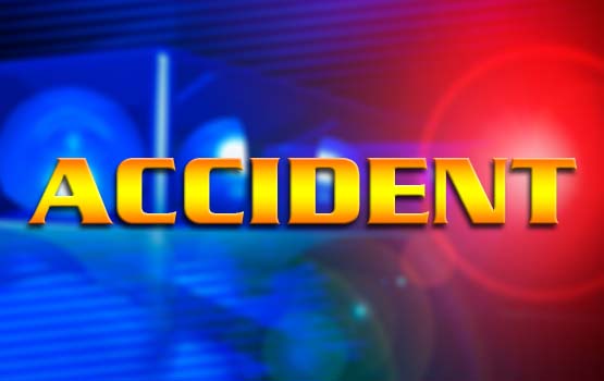 Driver strikes rock wall