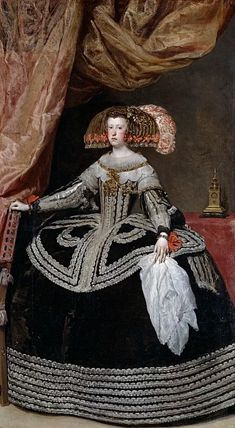 A young lady is shown standing in a black dress with a wide farthingale.