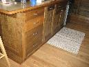 Select Sinker Cypress used to create kitchen cabinets.