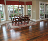 Select Reclaimed Longeaf Pine Flooring 1x6 with light brown stain.