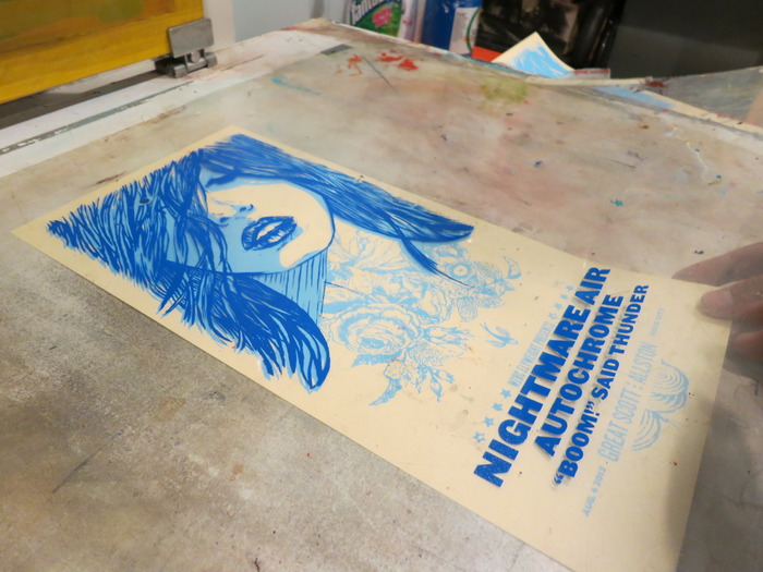 Gig posters being made.