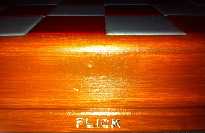 FLICK (engraved into ceramic board)