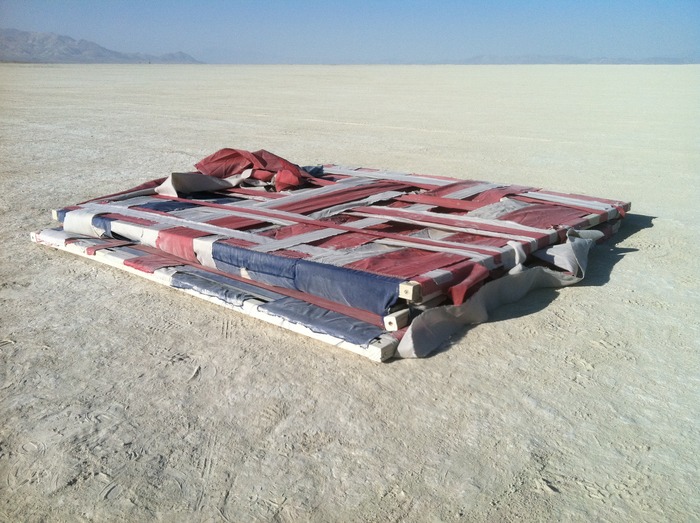 "American Cube" collapsed and ready to find its new home in a desert container.