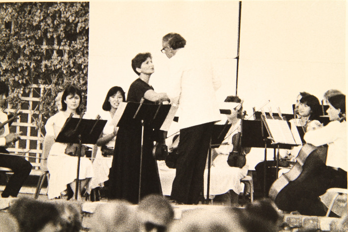 PACO's Founding Conductor, Maestro William Whitson, and violinist Jenny Rudin celebrate a successful performance in this rare, historical photo.