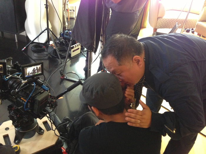 Cinematographer David Y. Chung and Director Ty Kim confer on how best to capture a shot while on set.
