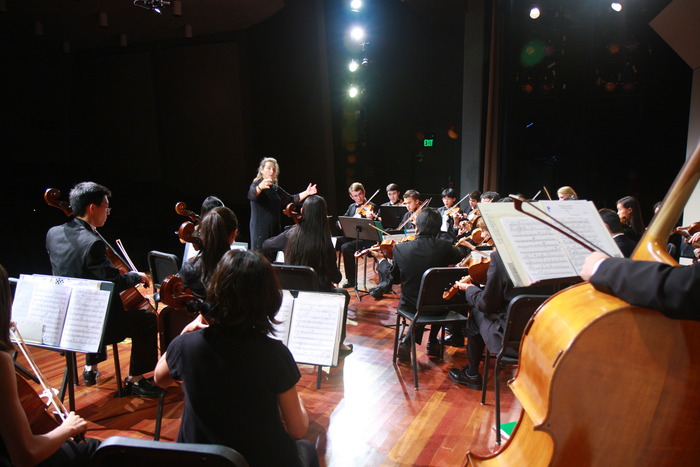 PACO Guest Conductor Kati Kyme leads the ensemble in a rousing performance of Bela Bartok's "Divertimento for String Orchestra."