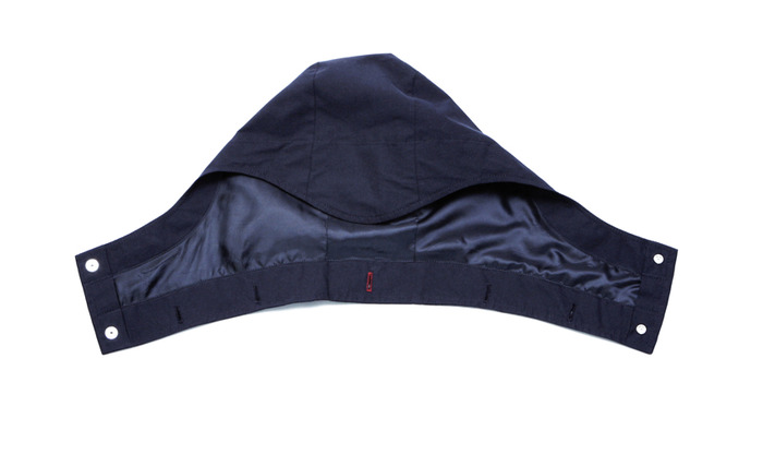 detachable hood with interior pocket for hood storage
