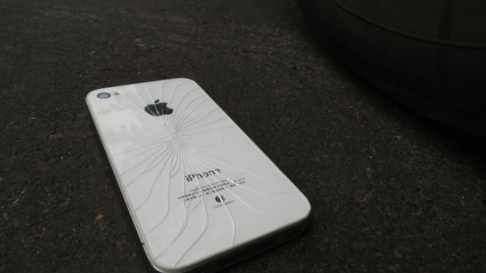 Cracked glass, iPhone drop from car seat.