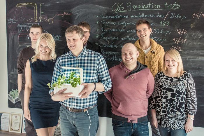 The team. The one holding the Smart Herb Garden prototype is our founder Mattias.