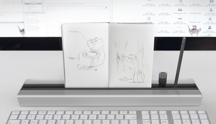 The Desk Rail can be used to hold reference materials right in front of you.
