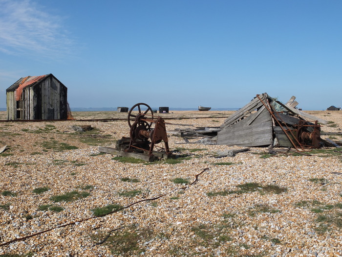 Old huts, decaying boats and  rusted machinary