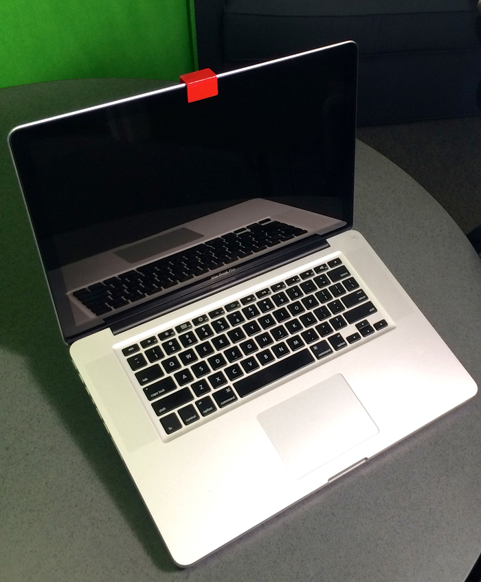 A demonstration of a red Shotblock on a 15" MacBook Pro.