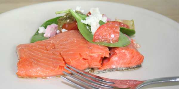 Sous vide salmon: 47C (116F) for 20 minutes in olive oil. Salad: basil, tomato, and feta with lemon dressing.
