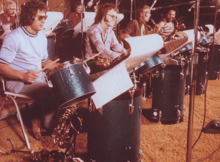 Photo from Hal's big Band. Reward doesn't include side drums. LEFT TO RIGHT FRONT ROW SAXES: JAY MIGLIORI*** TOM SCOTT****BILL "PERK" PERKINS****JACKIE KELSO....... UPPER RIGHT:LEW MACREARY TROMBONE, UPPER L