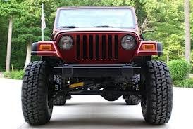 Exposed upper wheels induce considerable vehicle drag at highway speeds, especially when facing any headwind