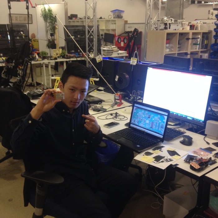 Wei working on a rather primitive Prometheus in the office.