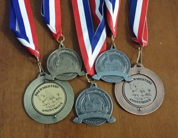 Some of our Wee Heavy's medals.  The totals so far?  3 gold, 2 silver, 1 Bronze in competitions!