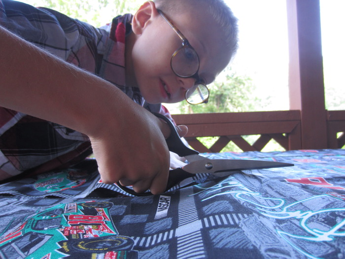 Michael Cutting The Fabric