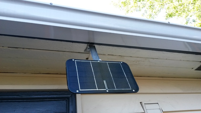 Solar panel installed under and eave