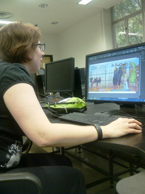 Brienne E. Wright hard at work finalizing the cover.