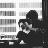 Daniel%20plays%20guitar.medium