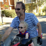 Liam%20and%20peter%20on%20bike%20(close%20up).medium