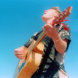1332460064_guitar_sky_photoshop_1.medium