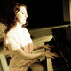 Pinkdressplayingpiano1kscrop.small