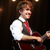 Ryan_smile_acoustic.medium