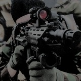 Guy%20with%20gun.medium