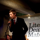 Ldm%20london%20black%20suit%20red%20tie.medium