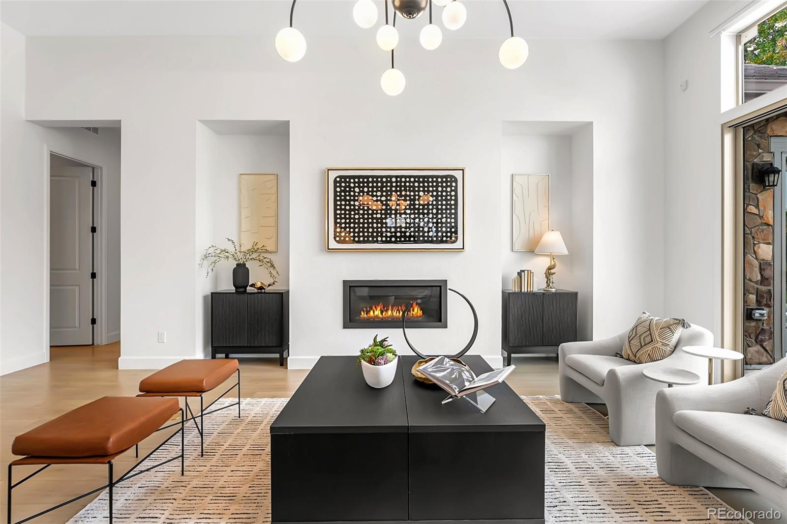 5 Latigo Place interior, Linear fireplace & curated art wall