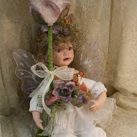 Sitting Porcelain Doll with Light 