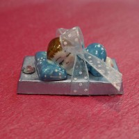Porcelain Baby Chocolate in Blue