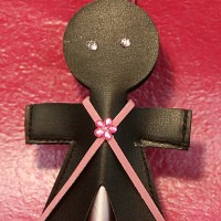 Leather Figure with Bar Chocolate