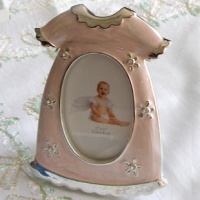 Pink enameled  baby dress frame