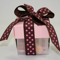 pink dot box with,  candies inside