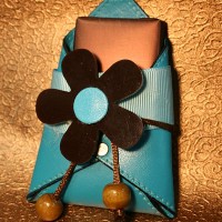 Turquoise Leather Pouch with Brown Flower and Oblong Chocolate 
