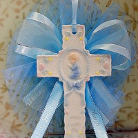 silver and gold wrapped chocolate with cross