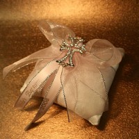 Pin Cross on a Pillow 